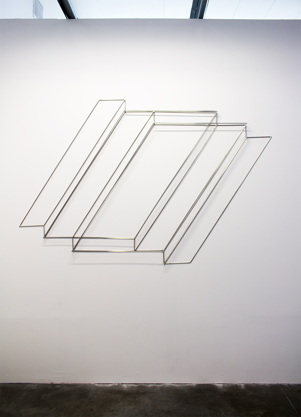 Niveles. Escultura de acero inoxidable